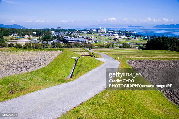 road through farm, kido, otsu, shiga prefecture, japan - préfecture de shiga photos et images de collection