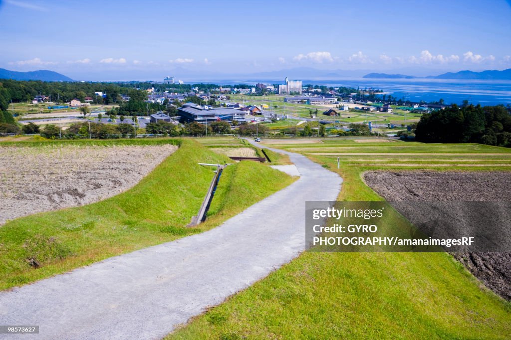 Road through farm, Kido, Otsu, Shiga Prefecture, Japan