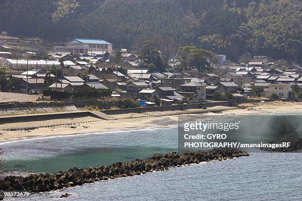 seaside town and seawall, echizen, fukui prefecture, japan - fukui prefecture foto e immagini stock