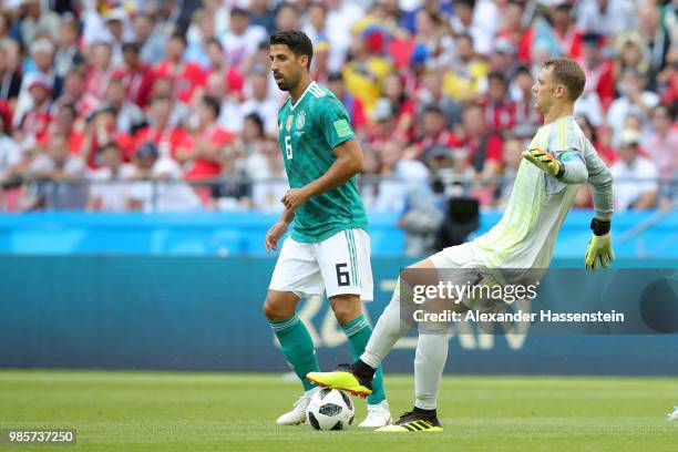 Manuel Neuer of Germany plays the ball with his team mate Sami Khedira during the 2018 FIFA World Cup Russia group F match between Korea Republic and...