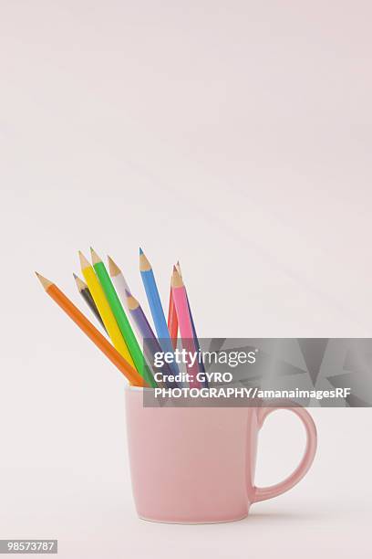 colored pencils in mug - creative rf stock-fotos und bilder