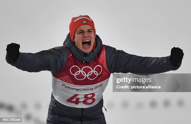 German Gold Medalist Ski jumper Andreas Wellinger celebrates winning the men's normal hill individual ski jumping competition on day one of the...