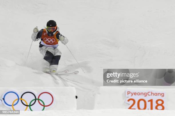 Tess Johnson of the USA in action during the 2nd round of the qualifications for the women's Olympic mogul freestlye skiing competition in the...