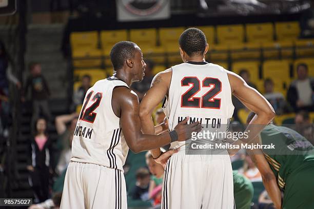 Andre Ingram and Brian Hamilton of the Utah Flash talk on court during the game against the Reno Bighorns at McKay Events Center on March 05, 2010 in...