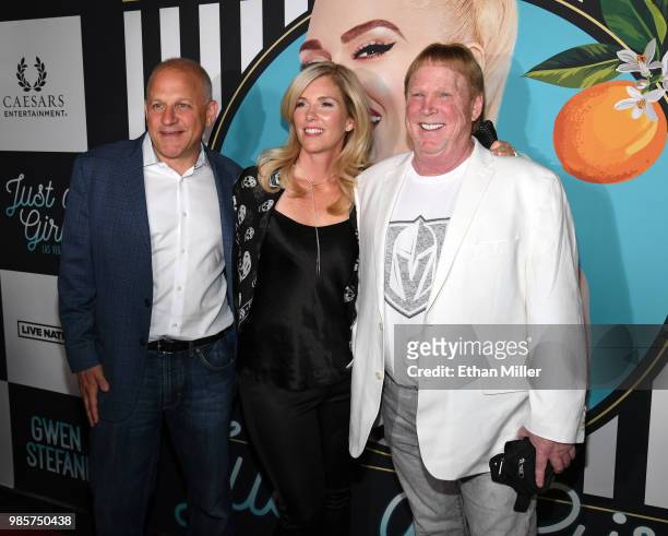 Oakland Raiders President Marc Badain, his wife Amy Badain and Raiders owner Mark Davis attend the grand opening of the "Gwen Stefani - Just a Girl"...
