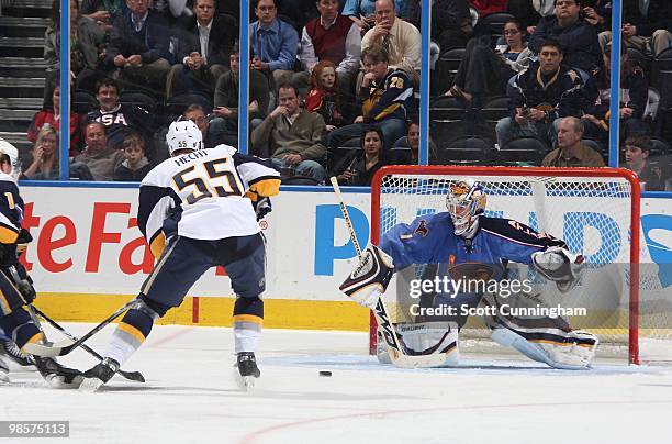 Johan Hedberg of the Atlanta Thrashers makes a save against Jochen Hecht of the Buffalo Sabres at Philips Arena on March 16, 2010 in Atlanta, Georgia.