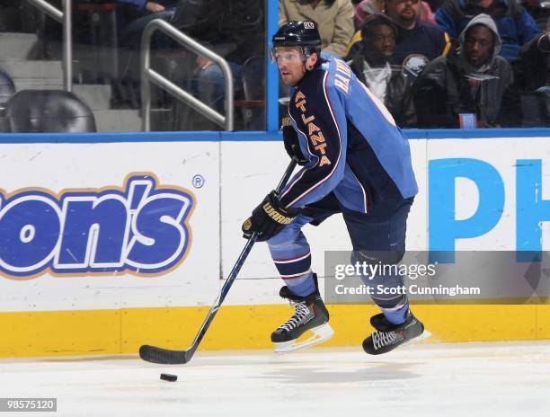 Ron Hainsey of the Atlanta Thrashers carries the puck against the Buffalo Sabres at Philips Arena on March 16, 2010 in Atlanta, Georgia.