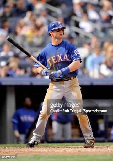 Michael Young of the Texas Rangers bats against the New York Yankees at Yankee Stadium on April 18, 2010 in the Bronx borough of Manhattan. The...