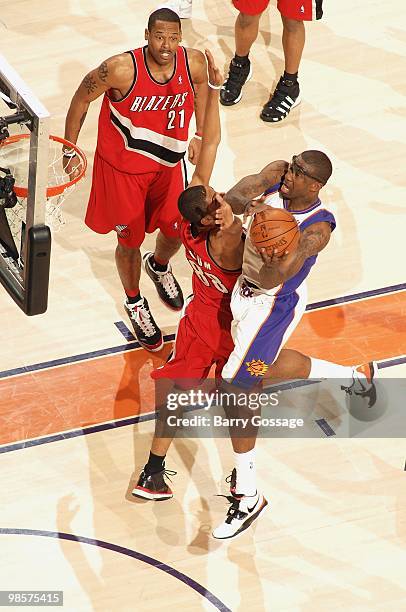 Amare Stoudemire of the Phoenix Suns takes the ball to the basket against Nicolas Batum of the Portland Trail Blazers in Game One of the Western...