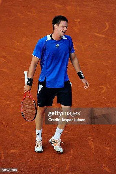 Robert Soderling of Sweden reacts during his match against Juan Ignacio Chela of Argentina on day two of the ATP 500 World Tour Barcelona Open Banco...