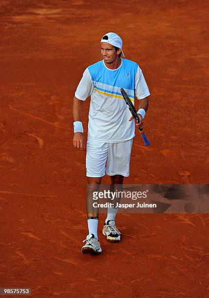 Juan Ignacio Chela of Argentina reacts during his match against Robert Soderling of Sweden on day two of the ATP 500 World Tour Barcelona Open Banco...