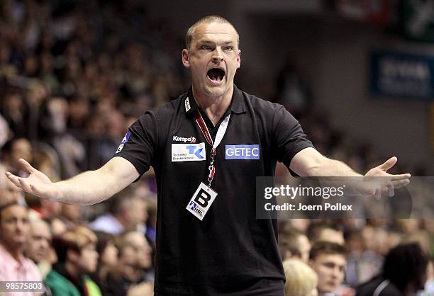 Head coach Sven Liesegang of Magdeburg gestures during the Toyota Handball Bundesliga match between SC Magdeburg and HSV Hamburg at the Boerdeland...