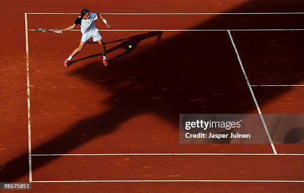 Oleksandr Dolgopolov of the Ukriane plays a forehand to Feliciano Lopez of Spain on day two of the ATP 500 World Tour Barcelona Open Banco Sabadell...