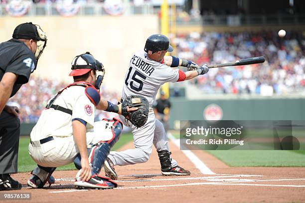 Dustin Pedroia of the Boston Red Sox bats during the Opening Day game against the Minnesota Twins at Target Field in Minneapolis, Minnesota on April...