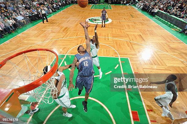Tyrus Thomas of the Charlotte Bobcats leaps for the rebound against Marquis Daniels of the Boston Celtics on March 3, 2010 at the TD Garden in...
