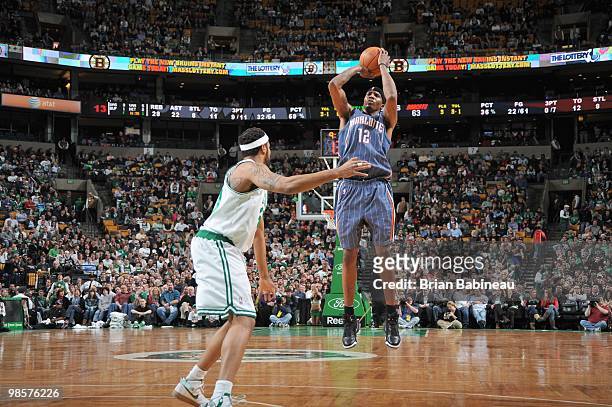 Tyrus Thomas of the Charlotte Bobcats takes a shot against Rasheed Wallace of the Boston Celtics on March 3, 2010 at the TD Garden in Boston,...