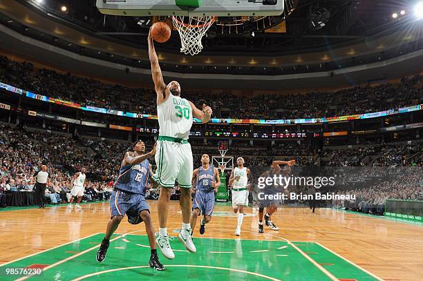 Rasheed Wallace of the Boston Celtics goes for the dunk against Tyrus Thomas of the Charlotte Bobcats on March 3, 2010 at the TD Garden in Boston,...