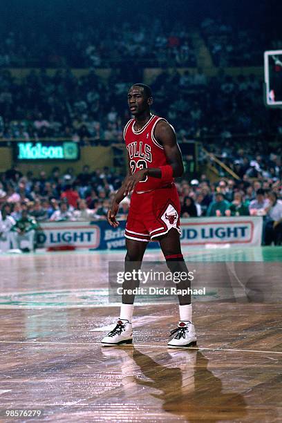 Michael Jordan of the Chicago Bulls stands on the court during a game played in 1987 at the Boston Garden in Boston, Massachusetts. NOTE TO USER:...