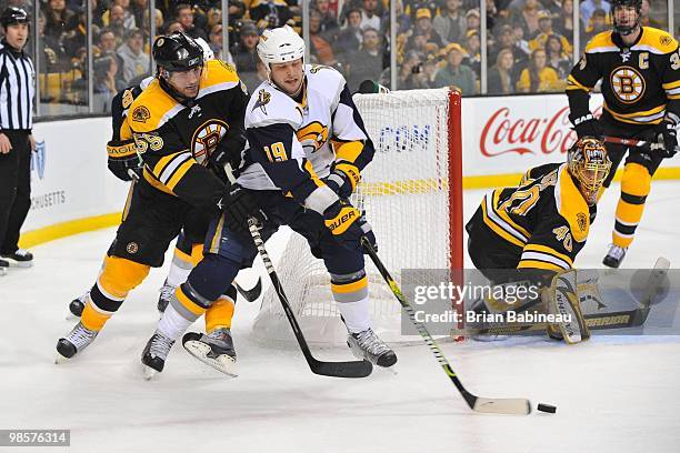 Tim Connolly of the Buffalo Sabers skates after the puck against Johnny Boychuk of the Boston Bruins in Game Three of the Eastern Conference...