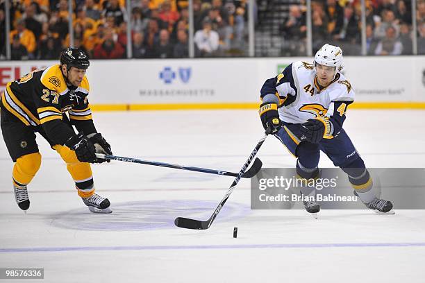 Andrej Sekera of the Buffalo Sabers skates after the puck against the Boston Bruins in Game Three of the Eastern Conference Quarterfinals during the...