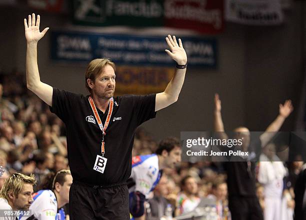 Head coach Martin Schwalb of Hamburg gestures during the Toyota Handball Bundesliga match between SC Magdeburg and HSV Hamburg at the Boerdeland Hall...