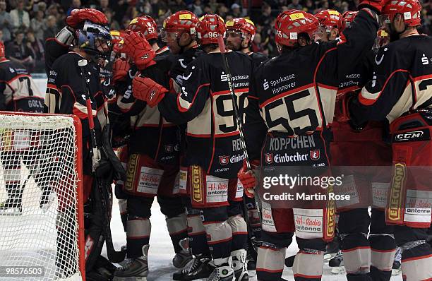 Travis Scott , goalkeeper of Hannover celebrates with his team mates after winning the DEL play off final match between Hannover Scorpions and...