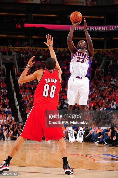 Jason Richardson of the Phoenix Suns takes a jump shot against Nicolas Batum of the Portland Trail Blazers in Game One of the Western Conference...