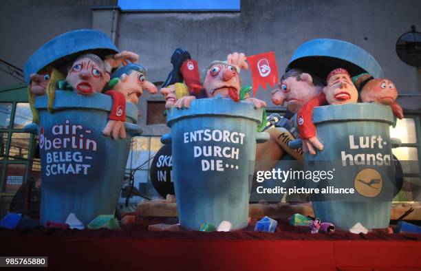 Political caricature float depicting the "Air Berlin takeover by Lufthansa" is prepared for the Rosenmontag carnival procession...