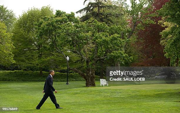 President Barack Obama walks from Marine One after arriving on the South Lawn of the White House in Washington, DC, April 20, 2010. Obama traveled to...