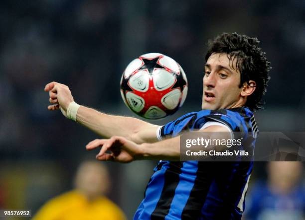 Diego Milito of Inter Milan controls the ball during the UEFA Champions League Semi Final First Leg match between Inter Milan and Barcelona at...