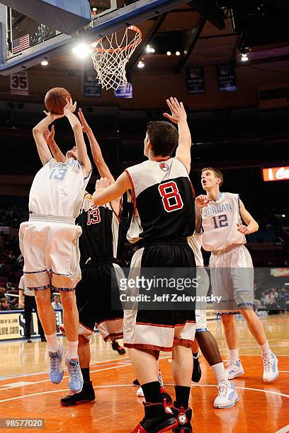 Albert Homs of White Jerseys goes for the basket against BLack Jerseys during the International Game at the 2010 Jordan Brand classic at Madison...