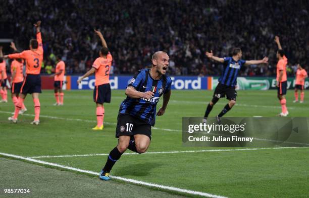 Wesley Sneijder of Inter celebrates his team's third goal, scored by Diego Milito, during the UEFA Champions League Semi Final 1st Leg match between...