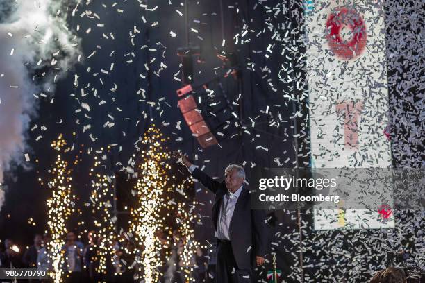Confetti falls as Andres Manuel Lopez Obrador, presidential candidate of the National Regeneration Movement Party , greets the crowd during the final...