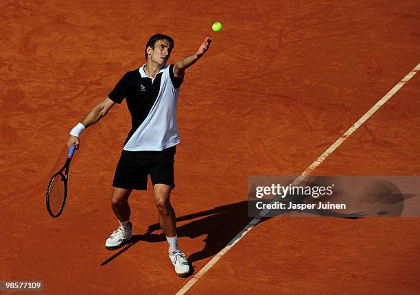 Tommy Robredo of Spain serves the ball to Simone Bolelli of Italy on day two of the ATP 500 World Tour Barcelona Open Banco Sabadell 2010 tennis...