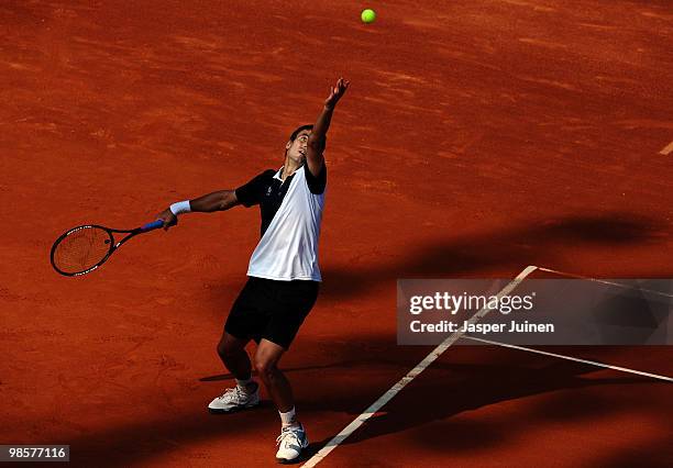 Tommy Robredo of Spain serves the ball to Simone Bolelli of Italy on day two of the ATP 500 World Tour Barcelona Open Banco Sabadell 2010 tennis...