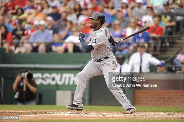 Designated hitter Ken Griffey Jr. #24 of the Seattle Mariners bats during the game against the Texas Rangers at Rangers Ballpark in Arlington in...