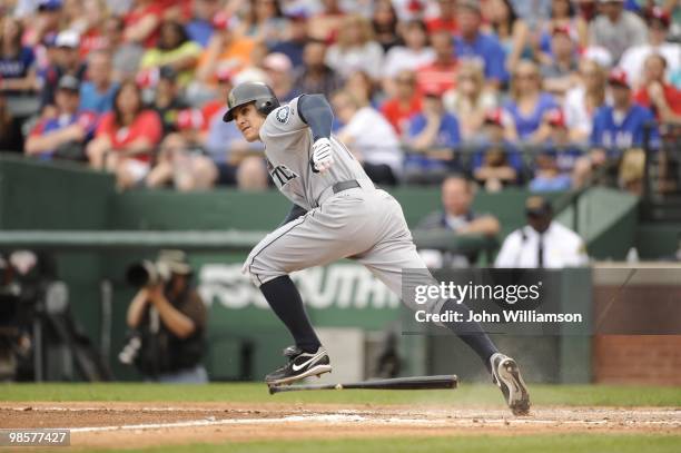 Eric Byrnes of the Seattle Mariners bats and runs to first base from the batter's box during the game against the Texas Rangers at Rangers Ballpark...