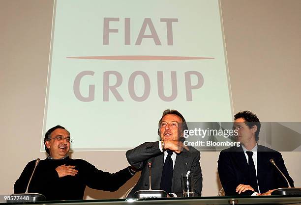 Luca Cordero di Montezemolo, chairman of Fiat SpA, center, speaks as Sergio Marchionne, the company's chief executive officer, left, and John Elkann,...