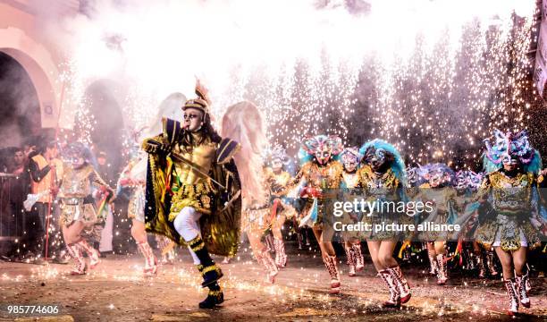 Dpatop - Carnival revellers perform a group dance in costume during a parade in Oruro, Bolivia, 11 February 2018. Photo: Angie Salgar/dpa