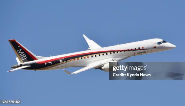 Photo taken June 27 shows the Mitsubishi Regional Jet, the first Japanese-made commercial jet under development by Mitsubishi Aircraft Corp., taking...