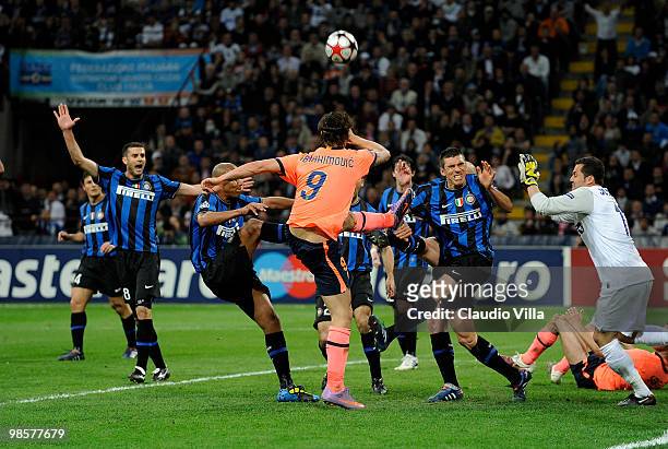 Lucio of Inter Milan competes for the ball with Zlatan Ibrahimovic of Barcelona during the UEFA Champions League Semi Final First Leg match between...