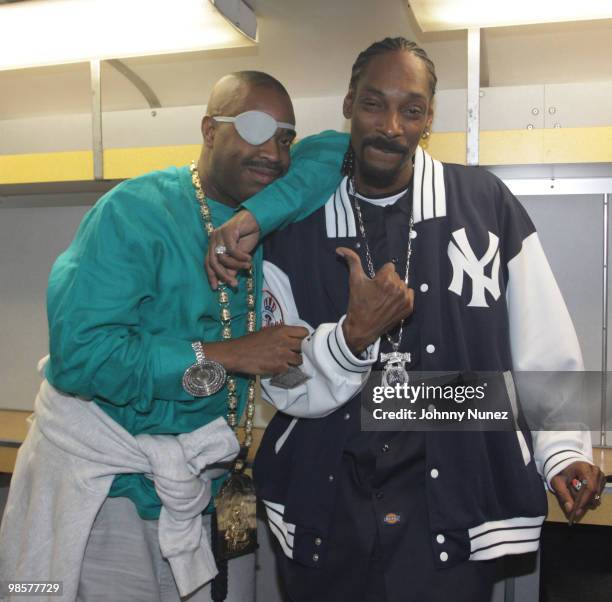 Slick Rick and Snoop Dogg pose for a picture backstage at Brooklyn Bowl on April 19, 2010 in the Brooklyn Borough of New York City.