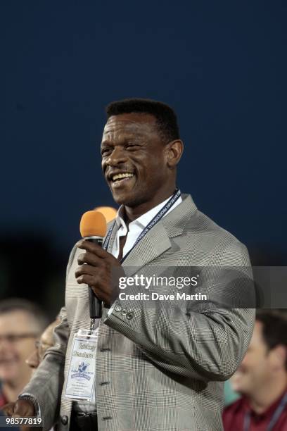 Hall of Famer Rickey Henderson makes remarks during pre-game ceremonies following the opening the Hank Aaron Museum at the Hank Aaron Stadium on...