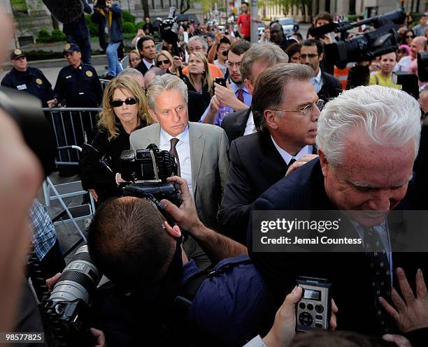 Actor Michael Douglas and his ex-wife, producer Diandra Douglas , depart the US District Court building following the sentencing of their son Cameron...