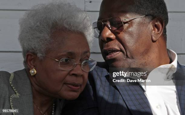 Baseball Hall of Famer Hank Aaron talks with his wife Billye during ceremonies opening the Hank Aaron Museum at the Hank Aaron Stadium on April 14,...