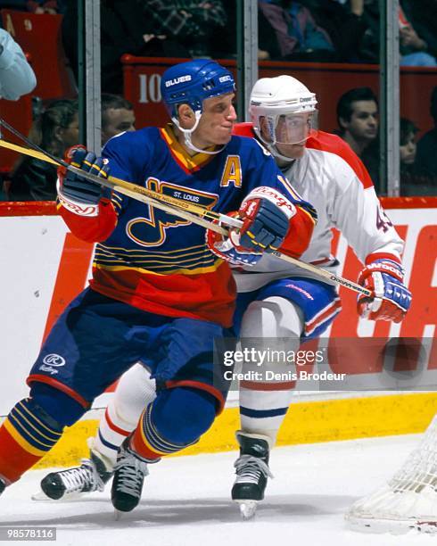 Brett Hull of the St. Louis Blues skates against the Montreal Canadiens in the 1990's at the Montreal Forum in Montreal, Quebec, Canada.