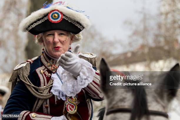 Rider of the Mainz' 'Ranzengarde' takes part in the Rosenmontag carnival procession in Mainz, Germany, 12 Febraury 2018. The 'Rosenmontagsumzug' is...