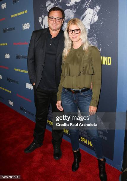 Actor / Comedian Bob Saget and Kelly Rizzo attend the premiere of "Robin Williams: Come Inside My Mind" from HBO Documentary Films' at the TCL...