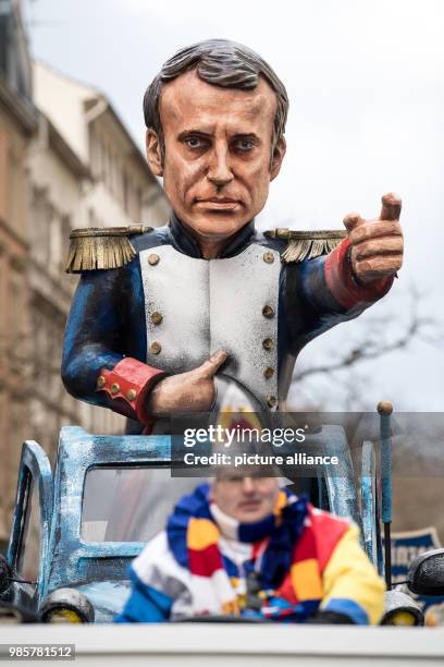 Political caricature float featuring the French Preisdent Macron posing Napoleon-like under the motto 'En Marche!' takes part in the Rosenmontag...