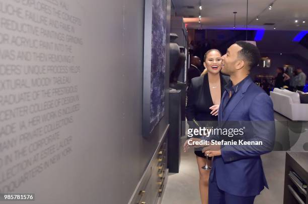 Chrissy Teigen and John Legend attend GENERAL PUBLIC x RH Celebration at Restoration Hardware on June 27, 2018 in Los Angeles, California.